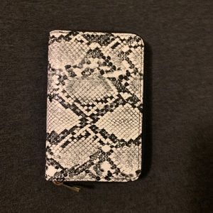 Pleather snake skin pattern wallet.